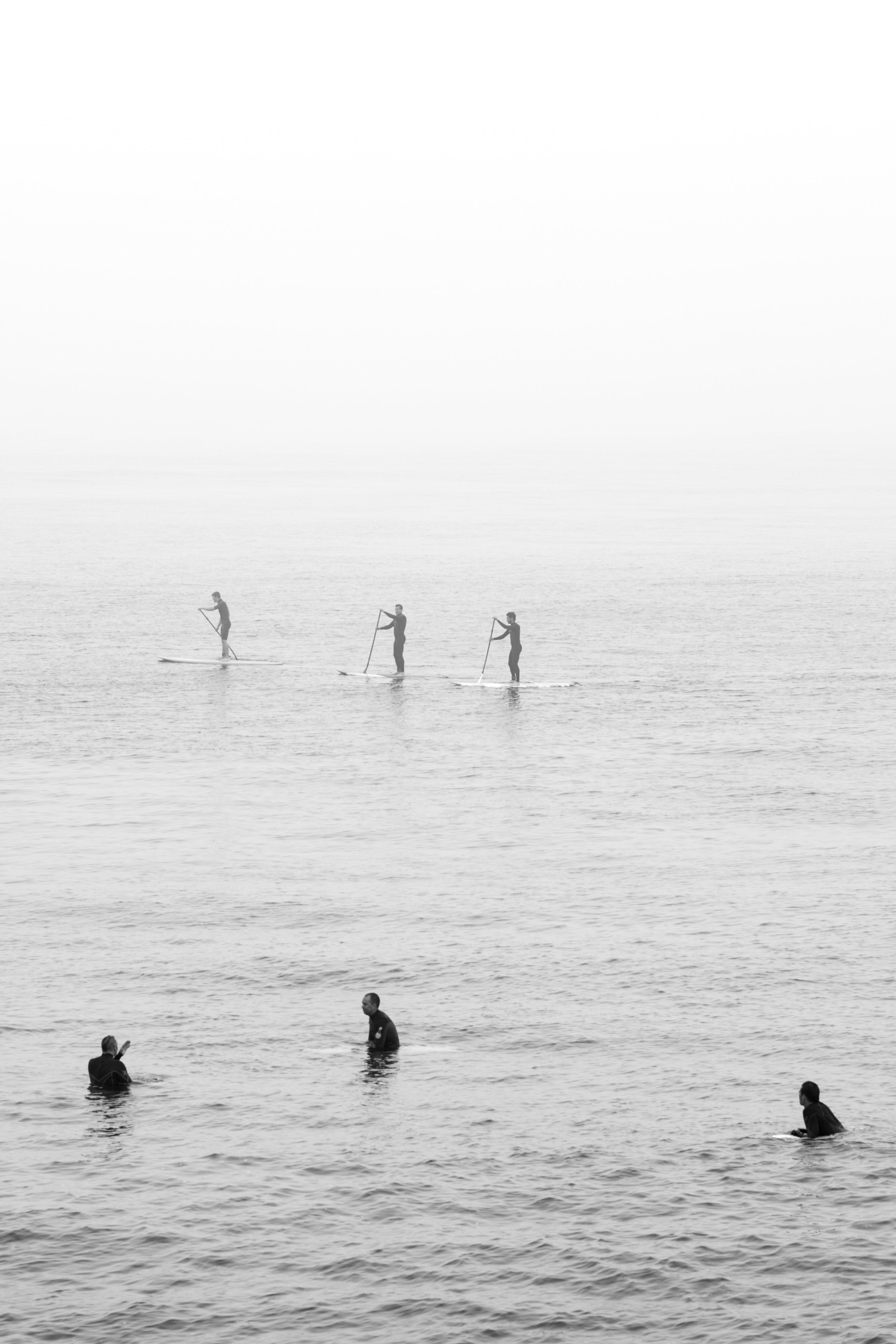 SUP Paddlers in Fog