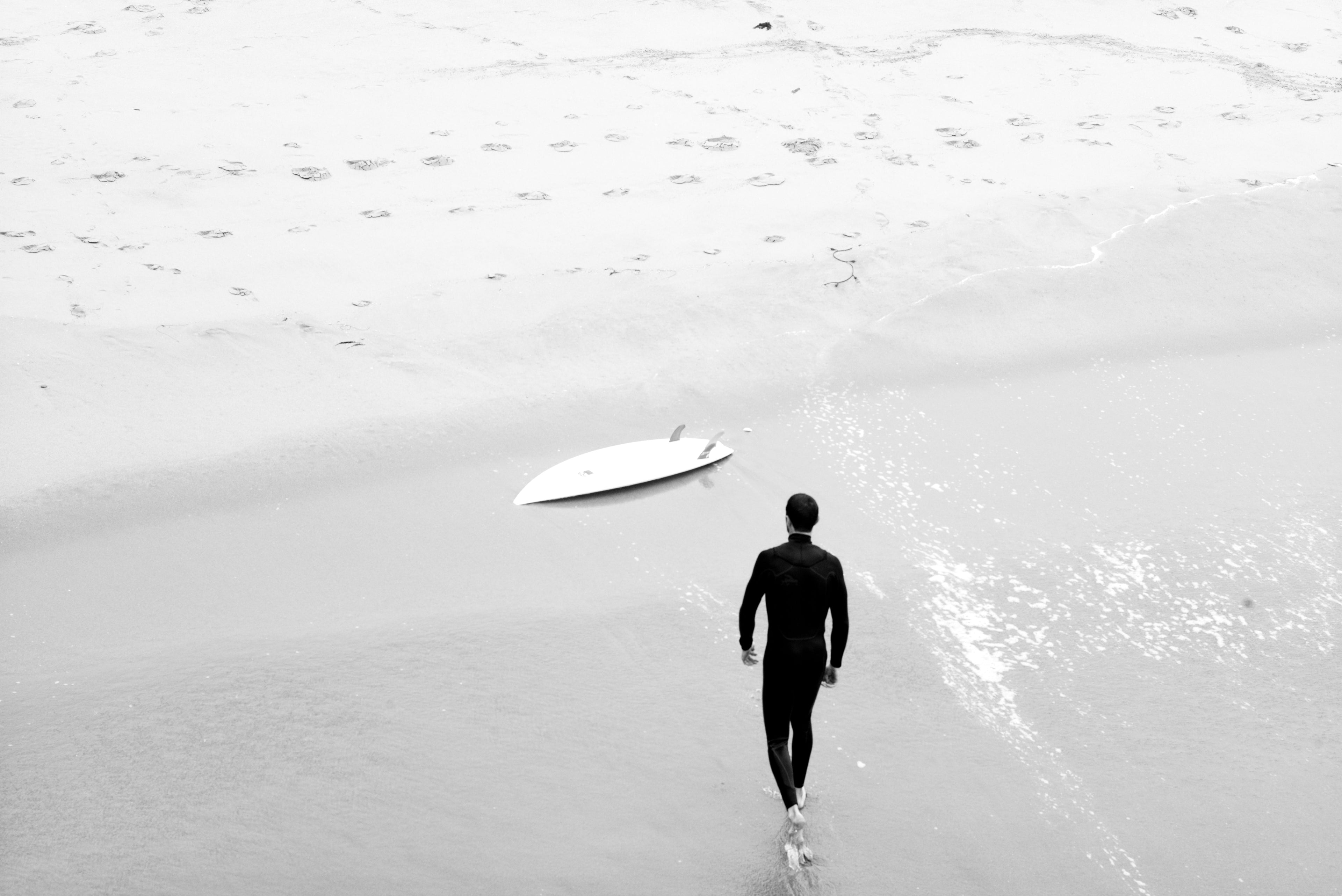 Surfer Walking Shore